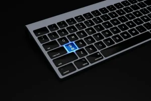 Teclado con tecla IA resaltada, haciendo alución ala automatización de procesos en agencias inmobiliarias